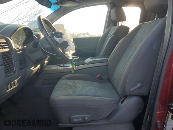 2006 Nissan Titan SE with VIN 1N6BA06B26N519672, listed as a Copart auction lot 74880744 with 144,568 mi miles and Salvage Title. Bid and sale history available at DreamBid. Image 7.