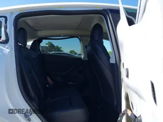 2022 Tesla Model Y Long Range with VIN 7SAYGDEE1NF364241, listed as a IAAI auction lot 42190272 with 54,878 mi miles and . Bid and sale history available at DreamBid. Image 8.