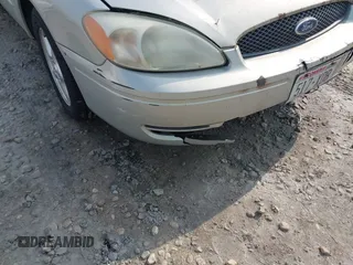 2004 Ford Taurus SE with VIN 1FAFP53U64A137175, listed as a IAAI auction lot 42824008 with 227,328 mi miles and . Bid and sale history available at DreamBid. Image 12.