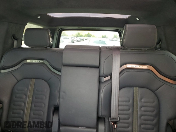 2022 Rivian R1S Launch Edition z VIN 7PDSGABL5NN001018, wystawiony jako Copart lot #56914725 z przebiegiem 26 156 mil mil oraz Szkoda całkowita • Salvage title. Historia ofert i sprzedaży dostępna na DreamBid. Obrazek 10.