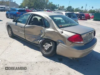 2006 Ford Taurus SE with VIN 1FAFP53U96A223924, listed as a IAAI auction lot 41828443 with 114,653 mi miles. Bid and sale history available at carsss.com. Image 3.