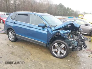 2020 Volkswagen Tiguan SE z VIN 3VV3B7AX5LM176136, wystawiony jako IAAI lot #41564431 z przebiegiem 74 867 mil mil oraz . Historia ofert i sprzedaży dostępna na DreamBid. Obrazek 1.