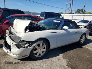 2002 Ford Thunderbird Hardtop Premium with VIN 1FAHP60A22Y129085, listed as a Copart auction lot 76359874 with Not Provided miles and Non Repairable. Bid and sale history available at DreamBid. Image 1.