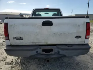 2002 Ford Super Duty F-250 XL with VIN 1FTNF20L22ED69572, listed as a Copart auction lot 80442804 with 218,461 mi miles and Salvage Title. Bid and sale history available at carsss.com. Image 6.