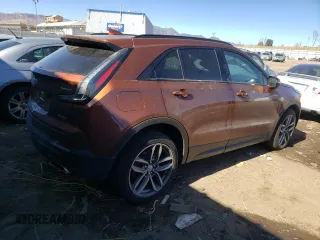 2021 Cadillac XT4 AWD Sport with VIN 1GYFZFR42MF054048, listed as a Copart auction lot 42597083 with 27,825 mi miles. Bid and sale history available at carsss.com. Image 3.