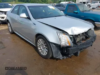 2010 Cadillac CTS Luxury with VIN 1G6DG5EGXA0128878, listed as a IAAI auction lot 42437362 with 102,726 mi miles and . Bid and sale history available at DreamBid. Image 1.