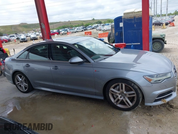2016 Audi A6 3.0T Premium Plus with VIN WAUFGAFC1GN047352, listed as a IAAI auction lot 41934958 with 111,834 mi miles. Bid and sale history available at carsss.com. Image 13.