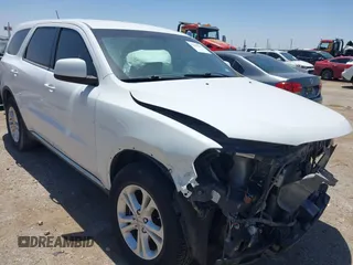 2013 Dodge Durango SXT with VIN 1C4RDHAG0DC696904, listed as a IAAI auction lot 42310831 with 112,964 mi miles and . Bid and sale history available at DreamBid. Image 1.
