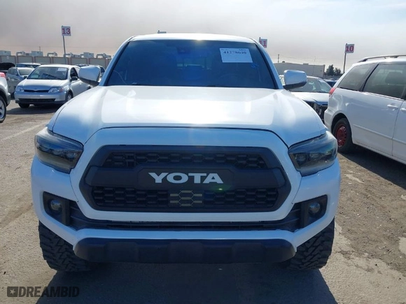 2019 Toyota Tacoma 4WD SR with VIN 3TMCZ5AN3KM277204, listed as a IAAI auction lot 41278640 with 78,930 mi miles. Bid and sale history available at carsss.com. Image 12.