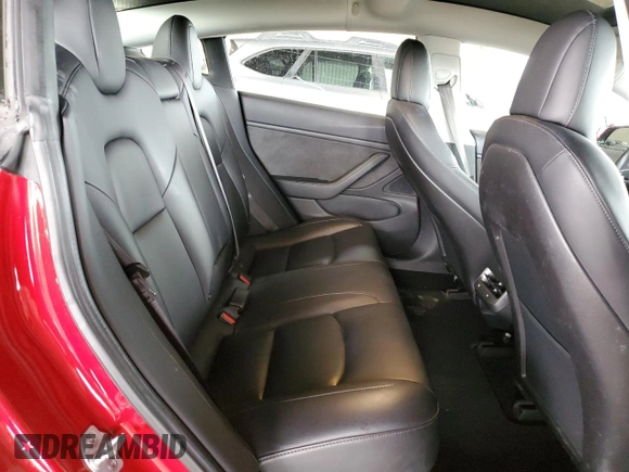 2018 Tesla Model 3 Long Range Battery z VIN 5YJ3E1EB3JF091637, wystawiony jako Copart lot #52127795 z przebiegiem 69 145 mil mil oraz Szkoda całkowita • Salvage title. Historia ofert i sprzedaży dostępna na DreamBid. Obrazek 10.