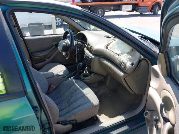 1998 Pontiac Sunfire SE with VIN 1G2JB5246W7538718, listed as a IAAI auction lot 41858046 with 54,433 mi miles. Bid and sale history available at carsss.com. Image 5.