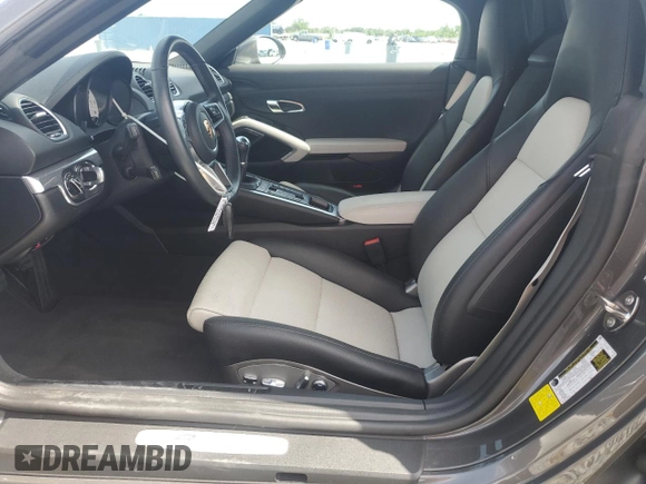 2023 Porsche Boxster with VIN WP0CA2A81PS205206, listed as a Copart auction lot 59809215 with 9,483 mi miles and Salvage title. Bid and sale history available at DreamBid. Image 7.