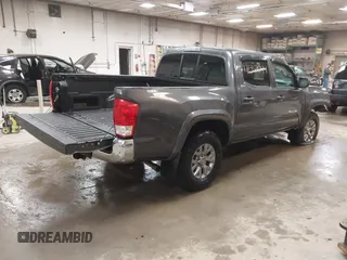 2017 Toyota Tacoma SR5 with VIN 3TMCZ5AN0HM066891, listed as a IAAI auction lot 41367044 with 130,351 mi miles and . Bid and sale history available at DreamBid. Image 4.