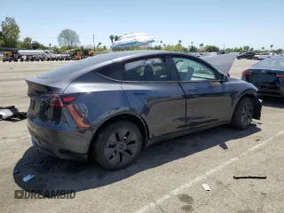 2024 Tesla Model Y с VIN 7SAYGDED5RF177307, выставлен на аукционе Copart как лот 57170315 с пробегом 14 726 миль миль и Списание • Salvage title. История ставок и продаж доступна на DreamBid. Изображение 3.