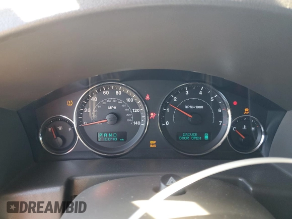 2006 Jeep Commander z VIN 1J8HG48K66C273648, wystawiony jako Copart lot #51920715 z przebiegiem 210 848 mil mil oraz Nie do naprawy • Non repairable. Historia ofert i sprzedaży dostępna na DreamBid. Obrazek 9.