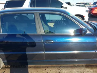 2001 BMW 7 Series 740iL with VIN WBAGH83401DP20636, listed as a IAAI auction lot 41646017 with 60,098 mi miles. Bid and sale history available at carsss.com. Image 13.