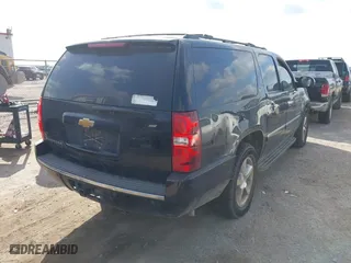 2014 Chevrolet Suburban LTZ with VIN 1GNSCKE08ER220808, listed as a IAAI auction lot 42022477 with 192,488 mi miles. Bid and sale history available at carsss.com. Image 4.