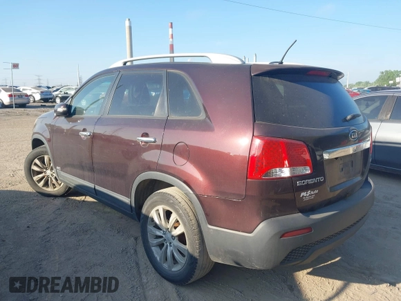 2011 Kia Sorento EX with VIN 5XYKUDA26BG059278, listed as a IAAI auction lot 42236023 with 197,740 mi miles and . Bid and sale history available at DreamBid. Image 3.