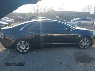2016 Lincoln MKZ with VIN 3LN6L2G98GR601230, listed as a IAAI auction lot 40869401 with 80,107 mi miles. Bid and sale history available at carsss.com. Image 13.