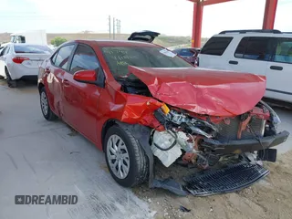 2018 Toyota Corolla L with VIN 5YFBURHE4JP851632, listed as a IAAI auction lot 42083602 with 103,821 mi miles and . Bid and sale history available at DreamBid. Image 1.