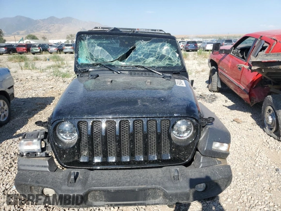 2023 Jeep Wrangler Sport Altitude with VIN 1C4HJXDN9PW634199, listed as a Copart auction lot 65940434 with Not Provided miles and Salvage Title. Bid and sale history available at DreamBid. Image 5.