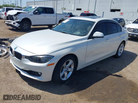 2012 BMW 3 Series 328i with VIN WBA3A5C51CF349987, listed as a IAAI auction lot 42013599 with 256,461 mi miles. Bid and sale history available at carsss.com. Image 18.