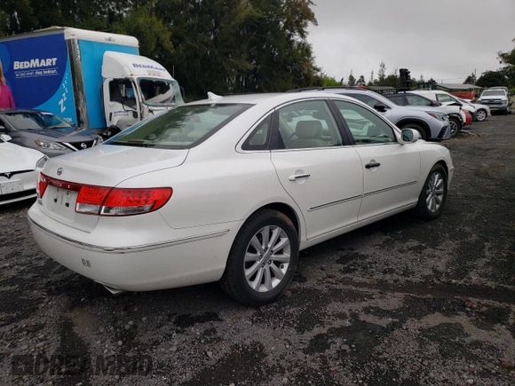 2010 Hyundai Azera GLS z VIN KMHFC4DD4AA513796, wystawiony jako Copart lot #59782965 z przebiegiem 56 958 mil mil oraz Szkoda całkowita • Salvage title. Historia ofert i sprzedaży dostępna na DreamBid. Obrazek 3.