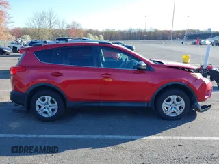 2014 Toyota RAV4 LE with VIN 2T3BFREV6EW227423, listed as a IAAI auction lot 42060083 with 87,215 mi miles and . Bid and sale history available at DreamBid. Image 13.