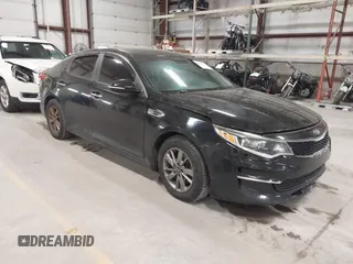 2016 Kia Optima LX Turbo with VIN 5XXGT4L16GG013751, listed as a IAAI auction lot 41843481 with 163,969 mi miles. Bid and sale history available at carsss.com. Image 1.