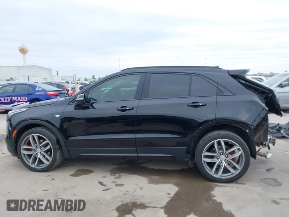 2021 Cadillac XT4 FWD Sport with VIN 1GYFZER40MF039140, listed as a IAAI auction lot 41287513 with 51,725 mi miles and . Bid and sale history available at DreamBid. Image 15.