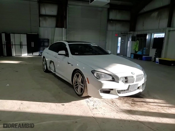 2015 BMW 6 Series 650i xDrive with VIN WBA6B4C56FD761374, listed as a Copart auction lot 41599334 with 63,057 mi miles and Salvage Title. Bid and sale history available at carsss.com. Image 11.