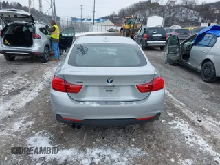 2016 BMW 4 Series 428i xDrive with VIN WBA4C9C53GG136870, listed as a IAAI auction lot 41410071 with 116,187 mi miles and . Bid and sale history available at DreamBid. Image 16.