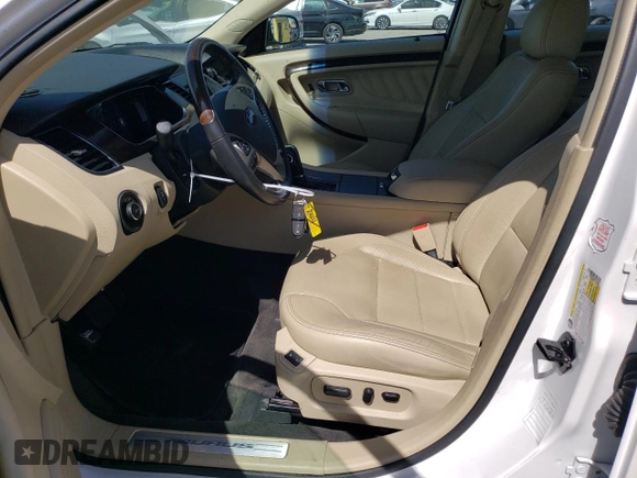 2016 Ford Taurus Limited with VIN 1FAHP2F85GG110993, listed as a Copart auction lot 61834125 with 76,872 mi miles and Salvage title. Bid and sale history available at DreamBid. Image 7.