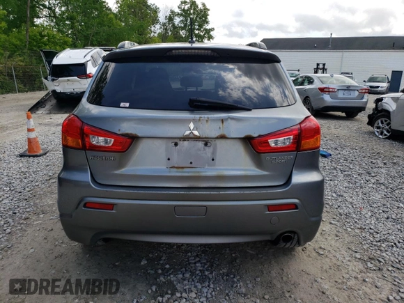 2011 Mitsubishi Outlander SE z VIN JA4AP4AU7BZ013457, wystawiony jako Copart lot #58860505 z przebiegiem 221 993 mil mil oraz Szkoda całkowita • Salvage title. Historia ofert i sprzedaży dostępna na DreamBid. Obrazek 6.