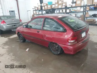 1997 Ford Aspire z VIN KNJLT05H1V6223510, wystawiony jako IAAI lot #41606132 z przebiegiem 142 891 mil mil oraz . Historia ofert i sprzedaży dostępna na DreamBid. Obrazek 3.