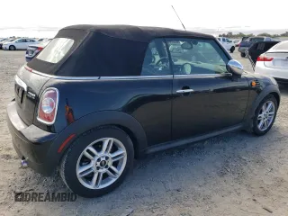 2011 MINI Convertible с VIN WMWZN3C50BT265016, выставлен на аукционе Copart как лот 65074435 с пробегом 77 923 миль миль и Списание • Salvage title. История ставок и продаж доступна на DreamBid. Изображение 3.