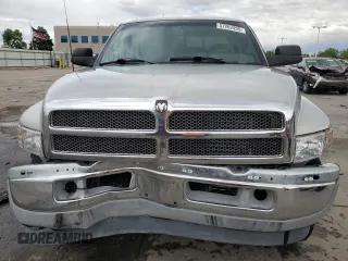 1999 Dodge 2500 z VIN 1B7KF2361XJ509781, wystawiony jako Copart lot #57282495 z przebiegiem 135 666 mil mil oraz Szkoda całkowita • Salvage title. Historia ofert i sprzedaży dostępna na DreamBid. Obrazek 5.