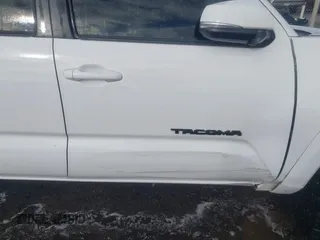 2019 Toyota Tacoma SR z VIN 3TMCZ5AN9KM284092, wystawiony jako IAAI lot #41774851 z przebiegiem 100 031 mil mil oraz . Historia ofert i sprzedaży dostępna na DreamBid. Obrazek 19.