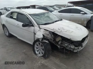 2011 Ford Taurus SE with VIN 1FAHP2DW3BG113398, listed as a IAAI auction lot 41617959 with 123,706 mi miles. Bid and sale history available at carsss.com. Image 1.