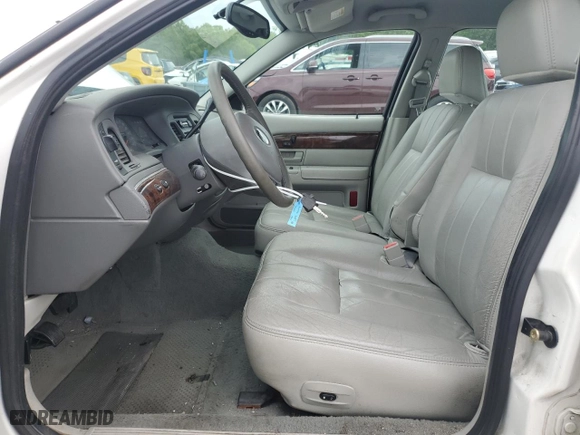 2004 Mercury Grand Marquis LS Premium with VIN 2MEFM75W34X667347, listed as a Copart auction lot 61209224 with 129,345 mi miles and Salvage Title. Bid and sale history available at carsss.com. Image 7.
