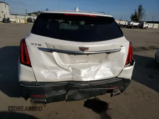 2022 Cadillac XT5 FWD Luxury z VIN 1GYKNAR49NZ118633, wystawiony jako Copart lot #43274175 z przebiegiem 46 946 mil mil oraz Szkoda całkowita • Salvage title. Historia ofert i sprzedaży dostępna na DreamBid. Obrazek 6.