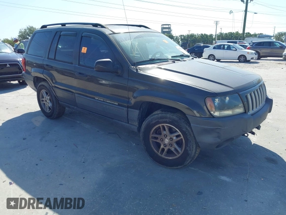 2004 Jeep Grand Cherokee Laredo with VIN 1J4GW48S74C401022, listed as a IAAI auction lot 41982319 with 170,607 mi miles. Bid and sale history available at carsss.com. Image 1.