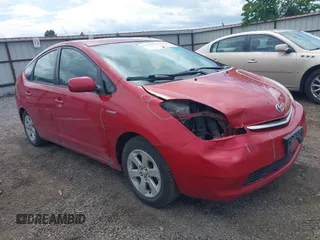 2009 Toyota Prius z VIN JTDKB20U293498019, wystawiony jako IAAI lot #42272706 z przebiegiem 186 055 mil mil oraz . Historia ofert i sprzedaży dostępna na DreamBid. Obrazek 1.