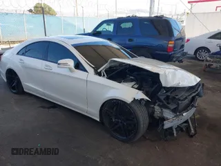 2014 Mercedes-Benz CLS-Class CLS 550 with VIN WDDLJ9BB8EA099963, listed as a IAAI auction lot 41825373 with 143,041 mi miles. Bid and sale history available at carsss.com. Image 1.