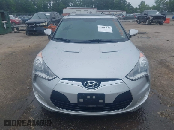 2012 Hyundai Veloster w/Black Int with VIN KMHTC6AD1CU034787, listed as a IAAI auction lot 42607847 with 126,912 mi miles and . Bid and sale history available at DreamBid. Image 13.
