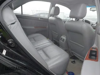 2003 Toyota Camry LE with VIN 4T1BE30K13U144114, listed as a IAAI auction lot 41829879 with 60,385 mi miles and . Bid and sale history available at DreamBid. Image 8.