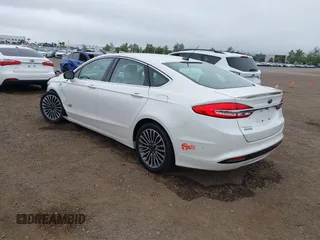2017 Ford Fusion Titanium with VIN 3FA6P0SU2HR379834, listed as a IAAI auction lot 42440382 with 55,646 mi miles and . Bid and sale history available at DreamBid. Image 3.