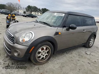 2013 MINI Clubman z VIN WMWZF3C59DT489823, wystawiony jako Copart lot #43089395 z przebiegiem 132 792 mil mil oraz Czysty tytuł • Clean title. Historia ofert i sprzedaży dostępna na DreamBid. Obrazek 1.