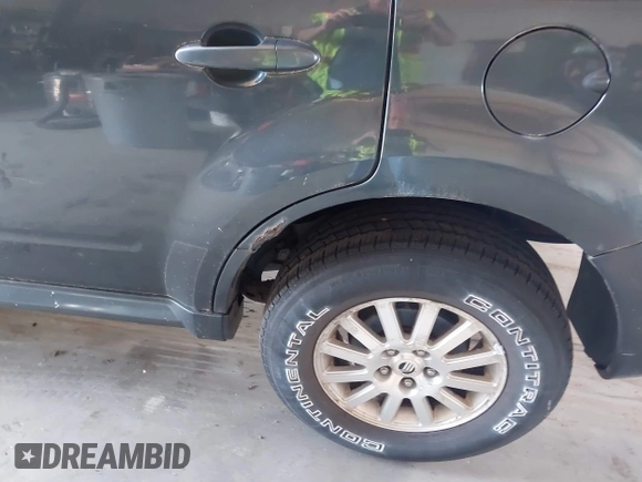 2008 Mercury Mariner Premier with VIN 4M2CU97198KJ30843, listed as a IAAI auction lot 42579794 with 109,983 mi miles and . Bid and sale history available at DreamBid. Image 12.