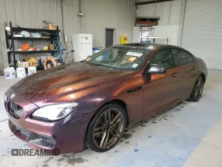 2016 BMW 6 Series 650i xDrive with VIN WBA6D6C55GGF94711, listed as a Copart auction lot 52917475 with 103,965 mi miles and Non Repairable. Bid and sale history available at carsss.com. Image 1.
